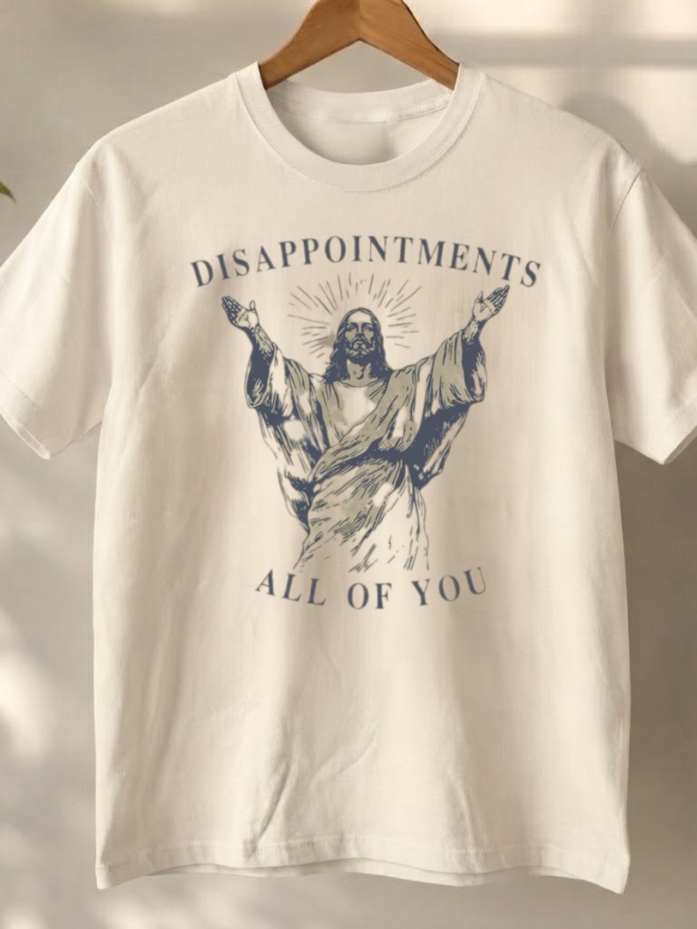 Off-White Graphic Short Sleeve Tee with Blue Illustration | Jesus Shirt